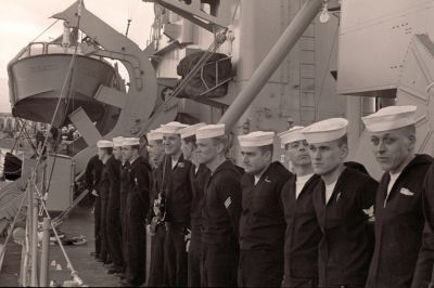 The fifth from the right may be Mereck.  However, I thought he reported on board as a 3rd class PO.

