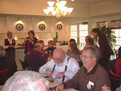 Cal Morehouse and Keith Cottrell...
standing at breakfast bar...Bonnie Beinhaur and Karen Layus.
