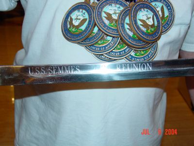 The sword inscribed with "USS Semmes 2004 Reunion"
